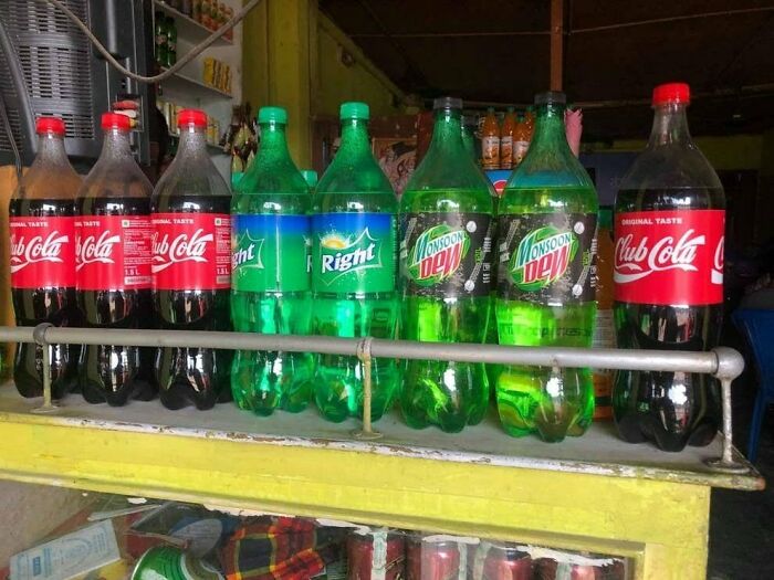 A row of generic soda brands like Club Cola, Right, and Monsoon Dew, an example of infuriating marketing practices.