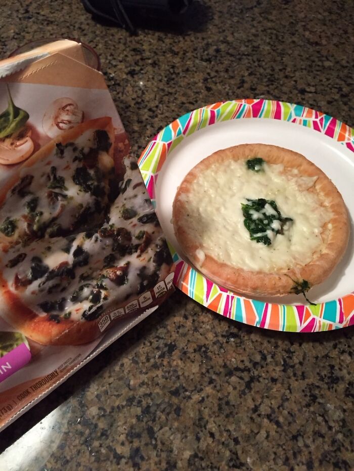 A small, cooked frozen pizza next to its package, depicting marketing practices that infuriate consumers due to misrepresentation.