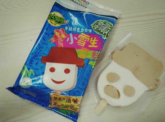 A disappointing ice cream bar that looks nothing like its package, an example of infuriating marketing practices.