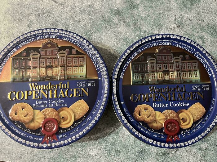 Two Wonderful Copenhagen Butter Cookies tins, showing marketing practices that might infuriate people due to design.