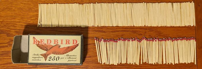 An open box of Redbird matches with many matches spilled out, illustrating potentially misleading marketing practices.