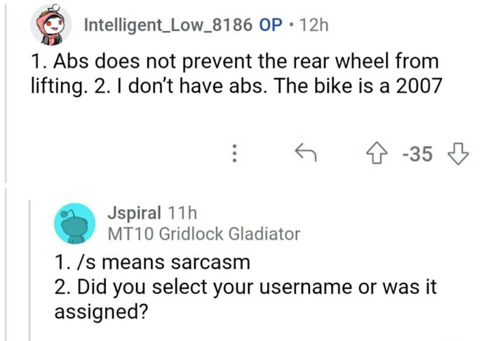 A screenshot of a Reddit thread showing a clever clapback, where one user delivers a roast to another user's comment about bikes and ABS. The exchange highlights a witty response in a discussion.
