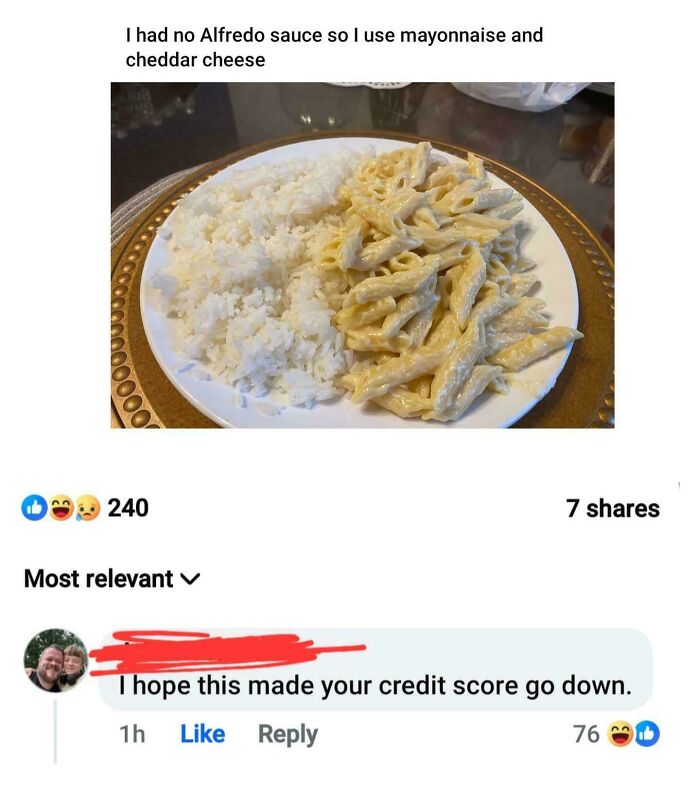 A plate of pasta with mayonnaise and cheddar cheese, followed by a clever clapback wishing the creator's credit score goes down.