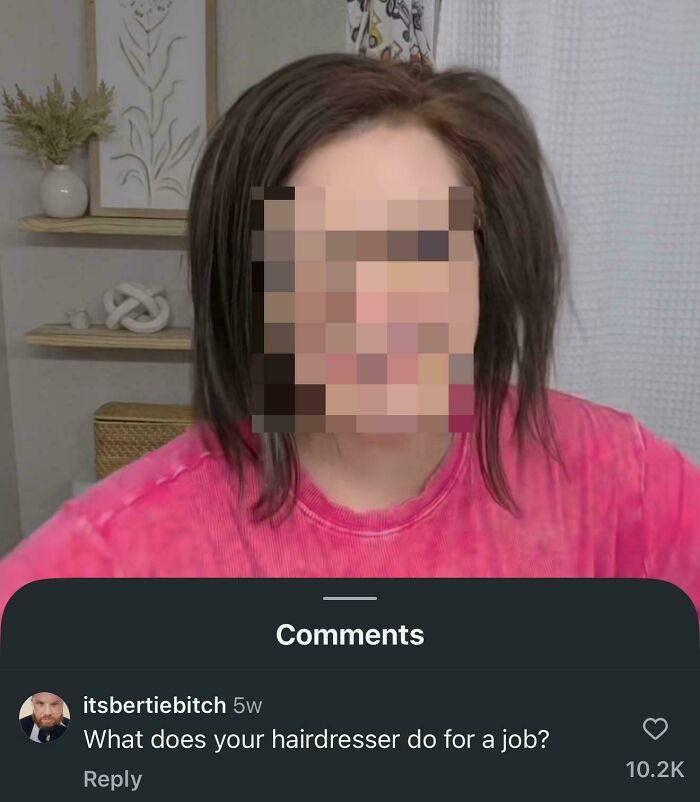 A blurred woman in a pink shirt receives a funny roast about her hairdresser's job.