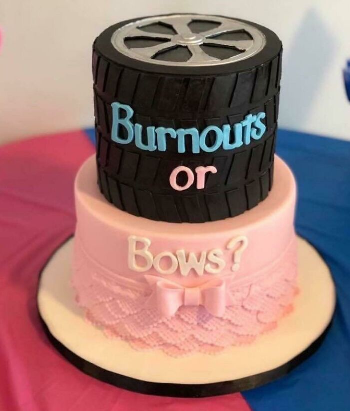 A tiered gender reveal cake with a tire on top saying Burnouts or and the bottom tier saying Bows?