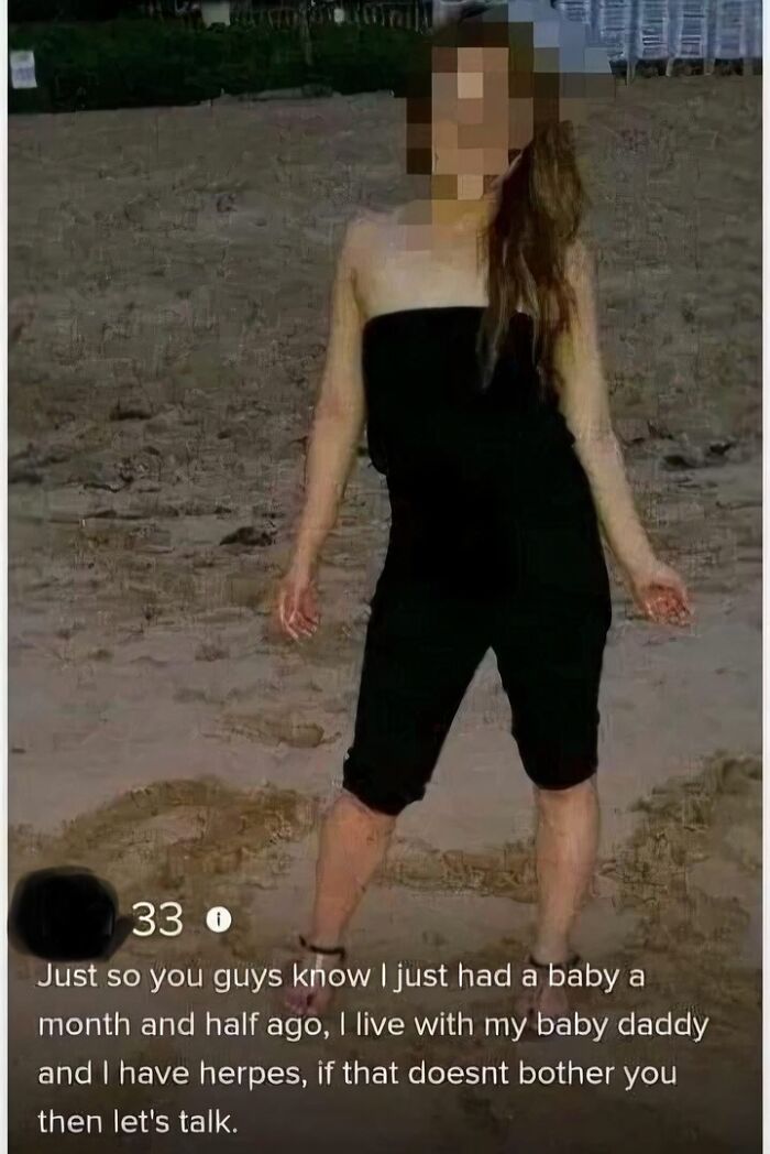 A woman on a dating app profile states her dating standards, including having a baby and herpes.
