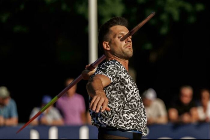 Real photos of a javelin thrower with the javelin appearing to go through his eye, making you question if it was edited.