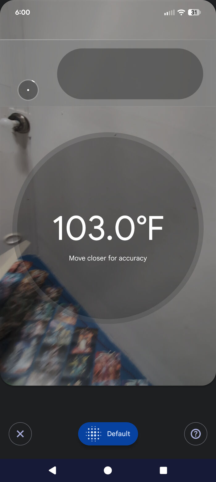 A phone screen showing a temperature of 103.0°F, indicating a fever or an extremely important forgotten health check.