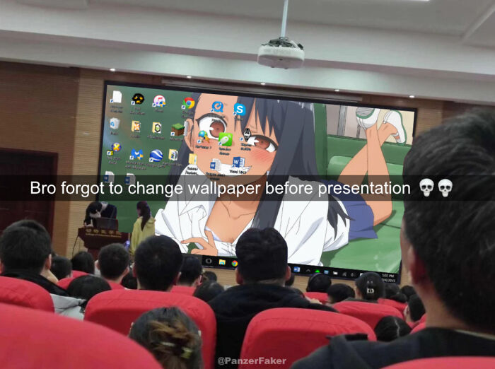 An anime girl wallpaper displayed during a presentation, illustrating someone forgetting something extremely important.