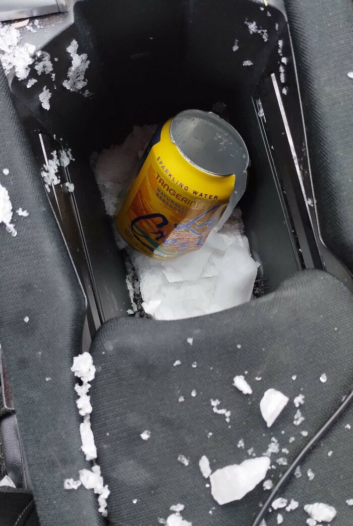 A sparkling water can exploded in a car, ruining the day by forgetting it in the cold.