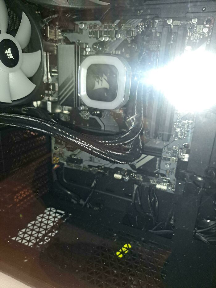 A brightly lit computer case shows the internal components, illustrating an important ruin of the day.