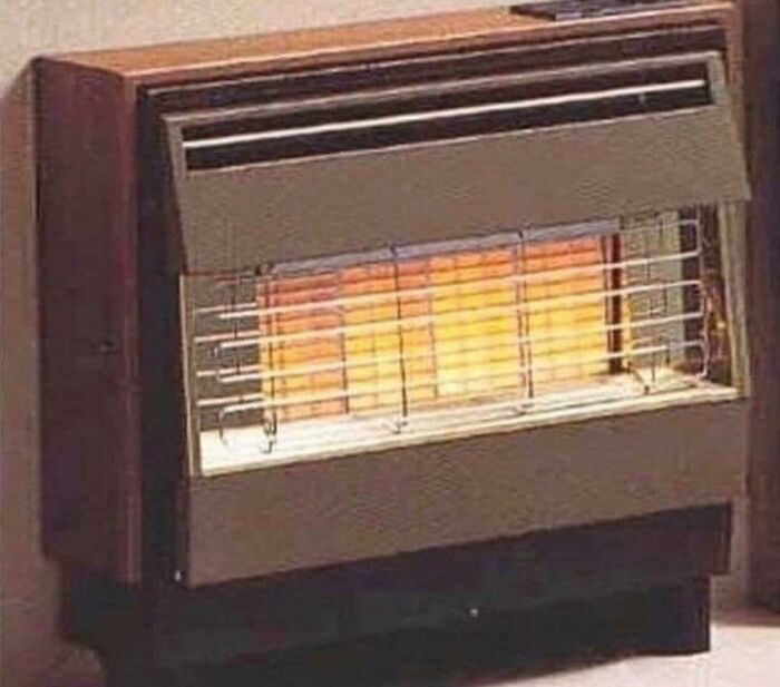 A retro gas heater with a glowing element, a common sight that brings good memories of life in the 80s.