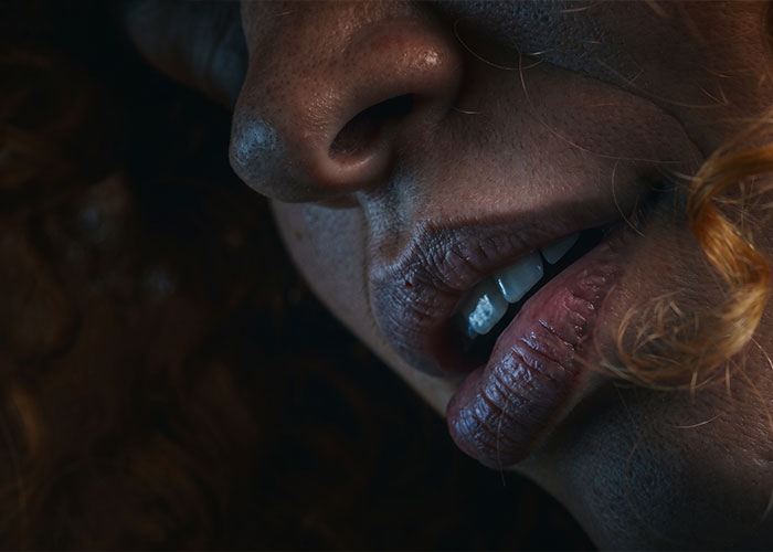 A close-up of a woman's lips, suggesting the intimate position called Queening. A close-up of a woman's lips, suggesting the intimate position called Queening.