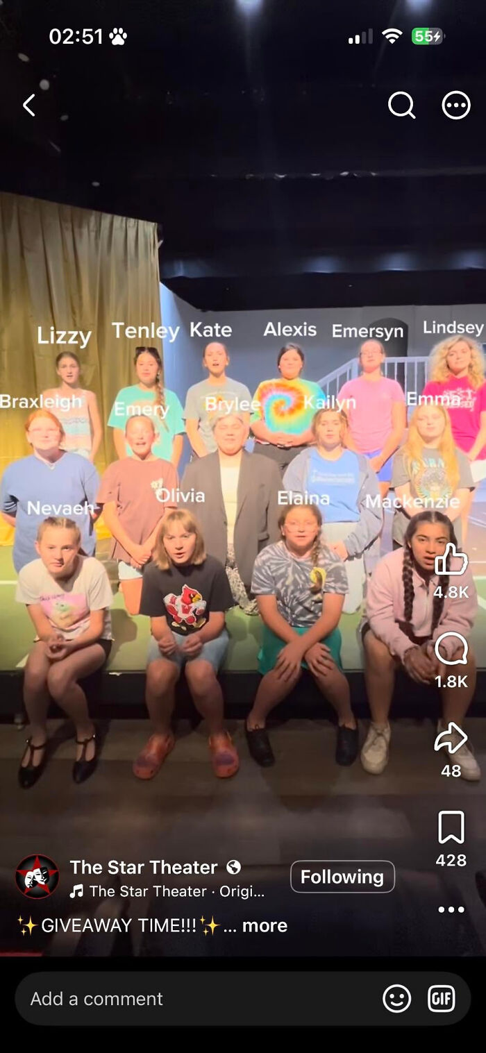 A group of young students and a teacher on a stage, highlighting unique names.