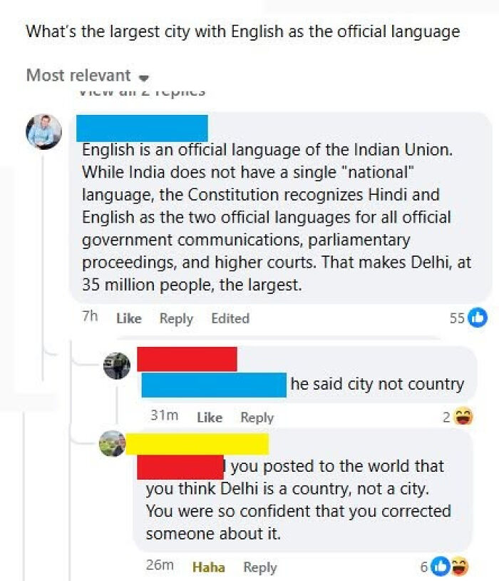 A social media interaction where someone corrects a poster about the largest city with English as an official language, revealing themselves as know-it-alls.