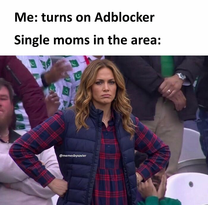 A humorous meme from Xavier showing a woman with a disgruntled expression, representing single moms reacting to an adblocker.