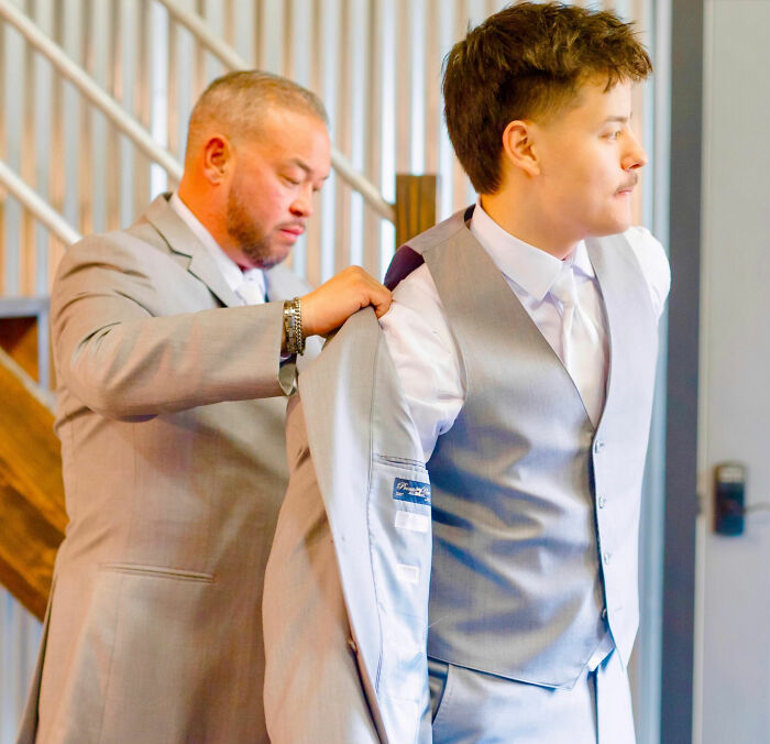 Collin Gosselin getting help with his suit, reflecting on claims about his horrifying childhood. Collin Gosselin getting help with his suit, reflecting on claims about his horrifying childhood.