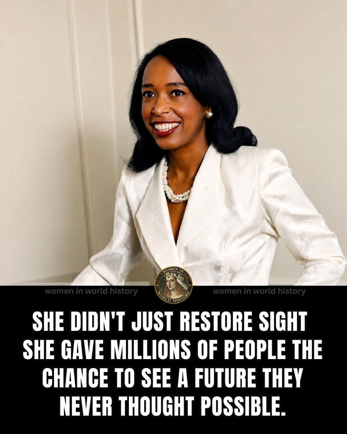 A distinguished woman in history, smiling confidently, recognized for her contributions to restoring sight.