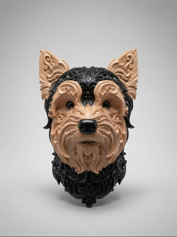 A detailed 3D printer creation of a Yorkshire terrier's head, intricately designed with ornate patterns.