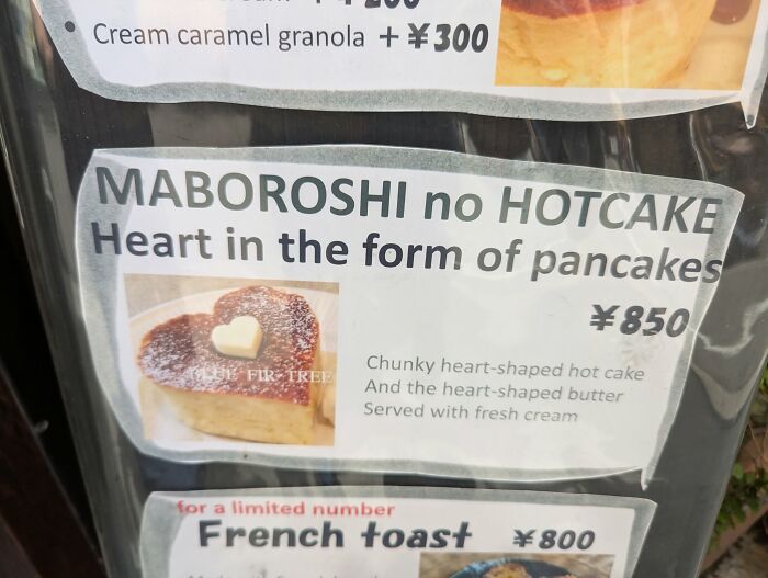 A menu in Japan, an example of getting lost in translation, offering MABOROSHI no HOTCAKE Heart in the form of pancakes.