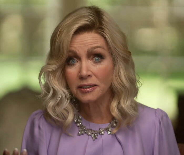 A Hollywood star with blonde hair and blue eyes, wearing a purple top and a pearl necklace, explaining her reasons. A Hollywood star with blonde hair and blue eyes, wearing a purple top and a pearl necklace, explaining her reasons.