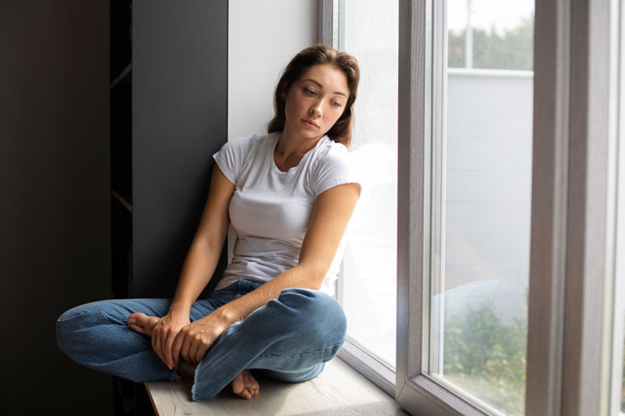 Sad GF looking out a window, reflecting on the mom's psycho smear campaign against her and the autistic guy. Sad GF looking out a window, reflecting on the mom's psycho smear campaign against her and the autistic guy.