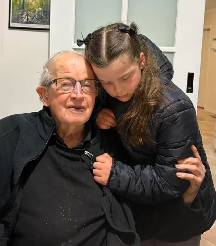 Elderly man hugging a young girl, relates to couple escaping care home. Elderly man hugging a young girl, relates to couple escaping care home.
