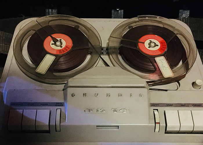An old reel-to-reel tape recorder, ready to play back stories of women leaving a man's home.