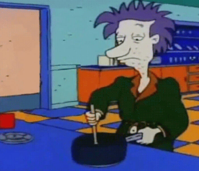 An animated character stirring a pot in a kitchen, a throwback meme for true 90s kids.