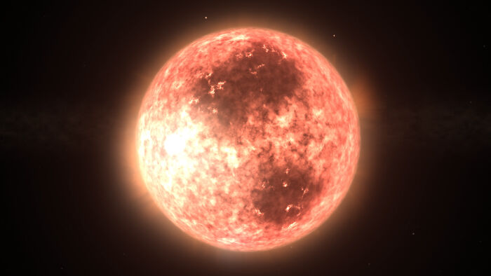 A red glowing star in space, showcasing fascinating things about the world.