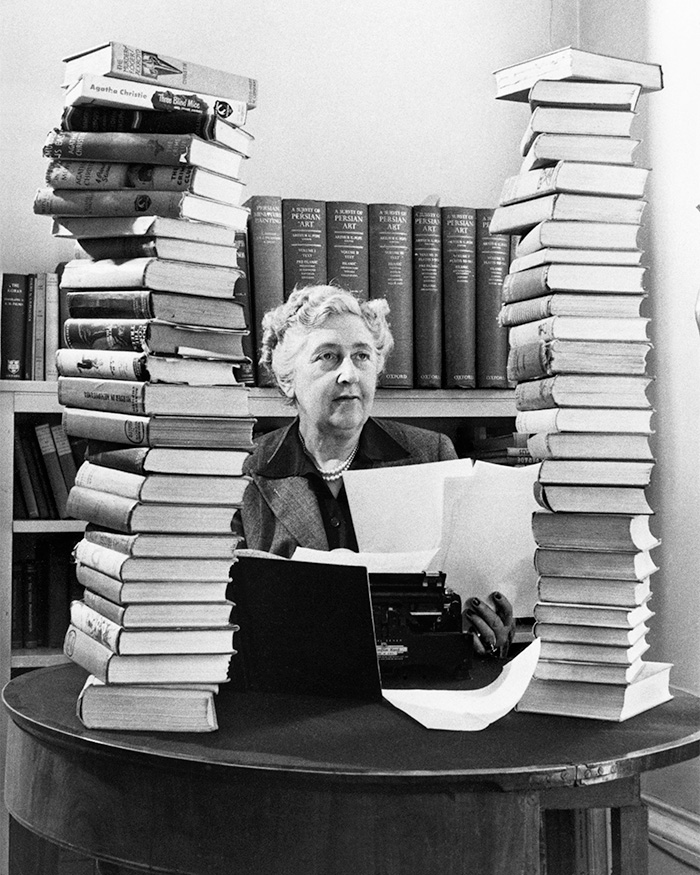 Agatha Christie, a famous celebrity, surrounded by books and a typewriter, highlighting an unsolved celebrity mystery.