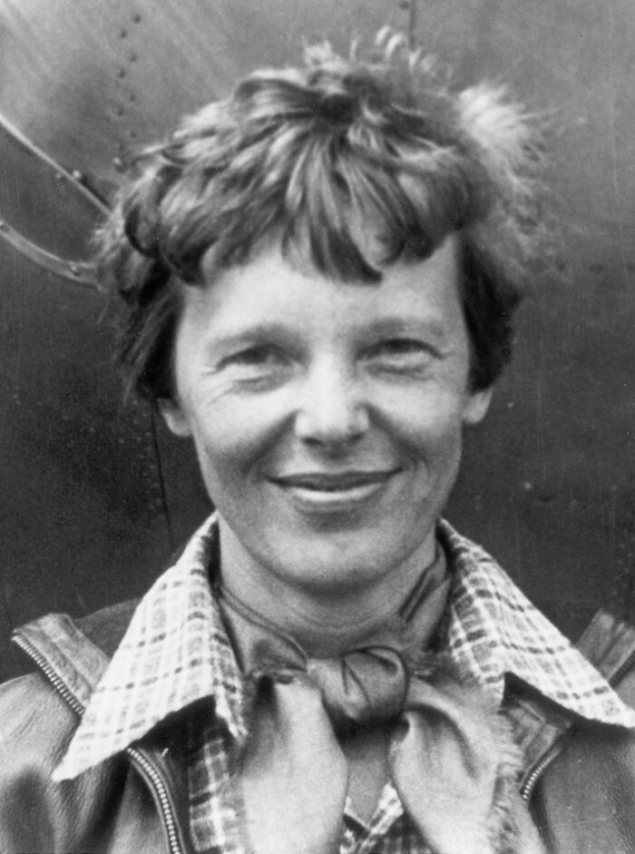 A black and white close-up photo of Amelia Earhart, one of the unsolved mysteries.