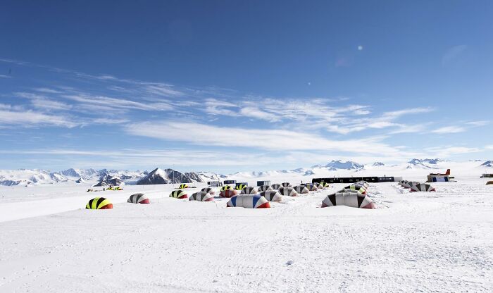 A fascinating view of colorful tents in a snowy landscape, showcasing something you probably didnt know about the world.