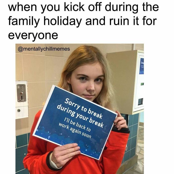 A girl holding a sign that says Sorry to break during your break, capturing the relatable meme experience of being somewhere between I'm fine and oh no.