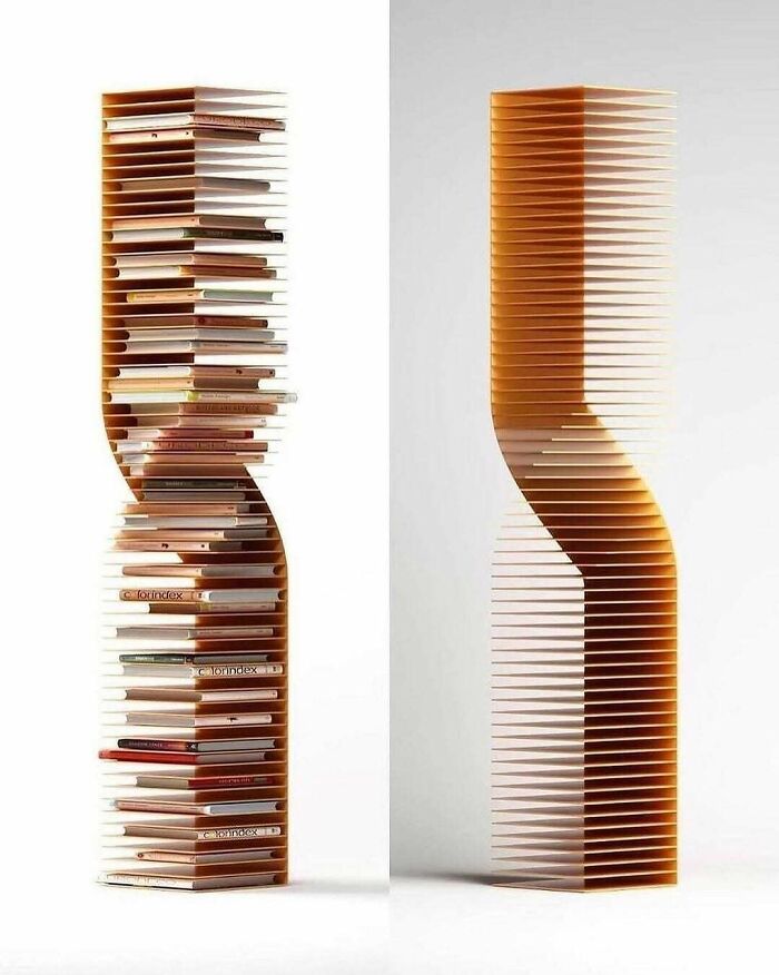 A tall, spiral-shaped bookshelf with brilliant design choices, filled with books on a white background.