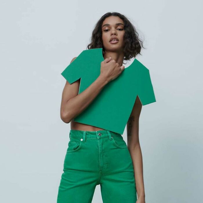A woman models a green paper cutout top and green jeans, an example of bizarre content on the Zara website.