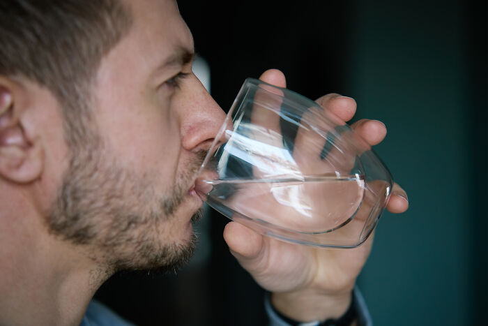 Man drinking water, representing an amazing comeback from a dry spell. Turned insults into art.