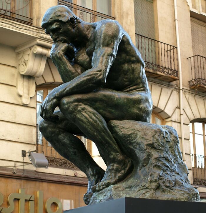 The Thinker statue by Rodin, a powerful image representing thoughtful comebacks and turning insults into art.