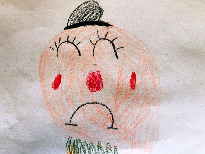 A child's drawing of a sad face, illustrating a moment before an amazing comeback.