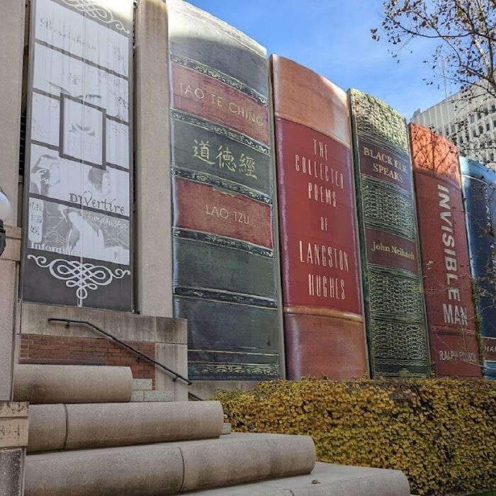 A building facade designed to look like giant book spines, showcasing brilliant design choices.