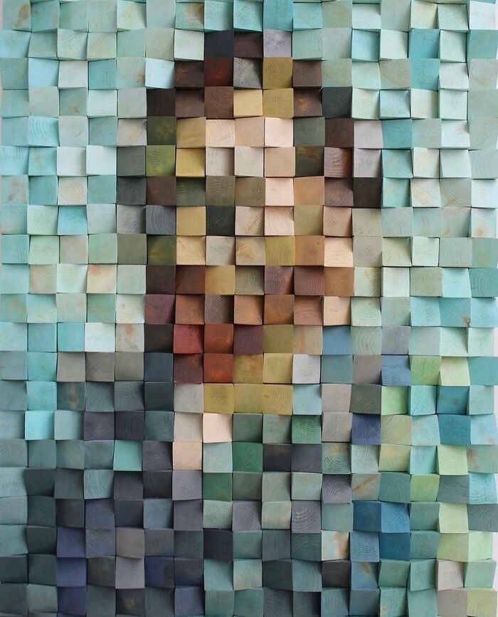 Mona Lisa portrait made from brilliant design choices of colorful wooden blocks.