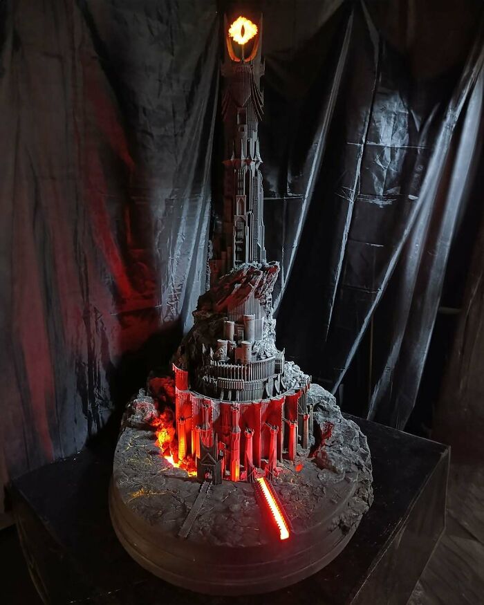 A detailed 3D printing creation of Barad-dûr with a glowing Eye of Sauron, an amazing 3D printing fan creation.