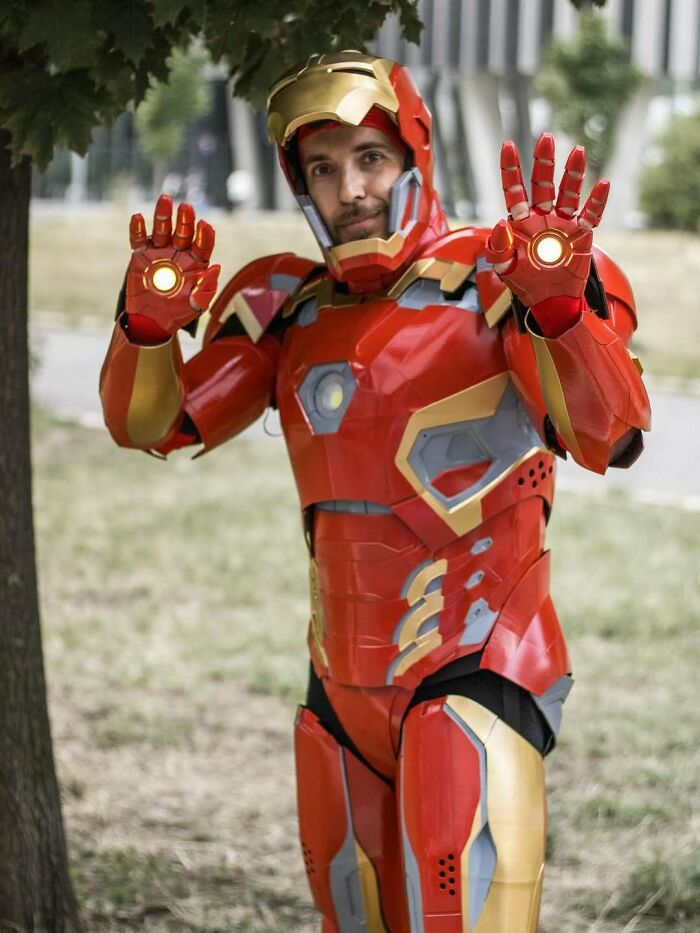 Person in a detailed Iron Man suit, a stunning example of 3D printing creations.