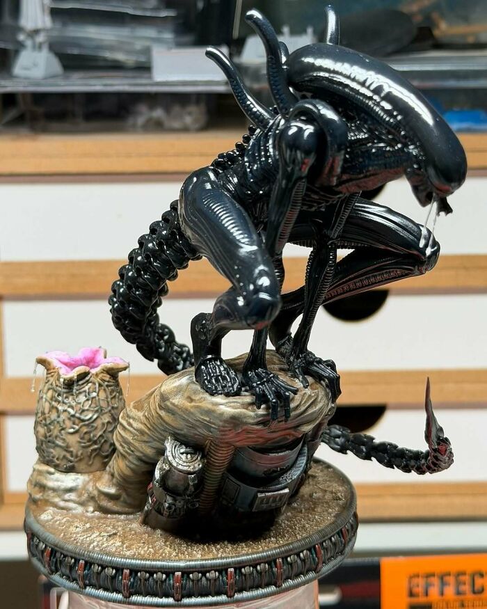An incredibly detailed 3D printing of an Alien xenomorph figurine, showcasing amazing creations.