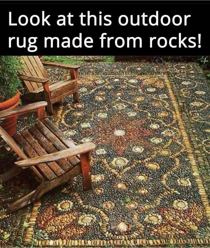 An outdoor rug made from various rocks, showcasing a clever craft project with intricate patterns.