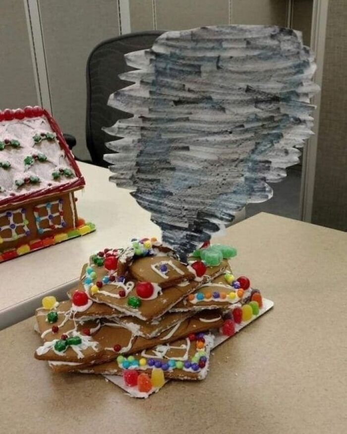 A gingerbread house torn apart by a paper tornado, a clever and humorous craft project.