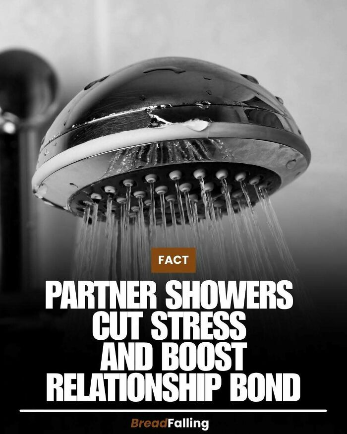 A shower head with water spraying, illustrating an interesting fact about partner showers reducing stress.