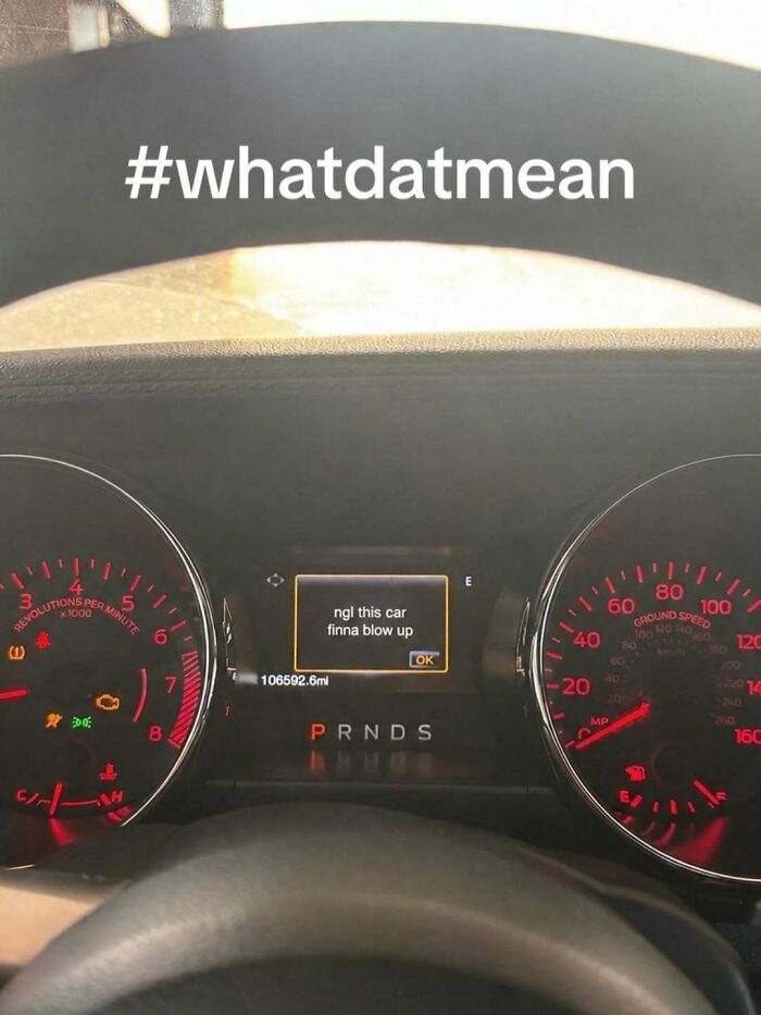 A car dashboard showing a warning message, ngl this car finna blow up, on the display, a cringe meme.