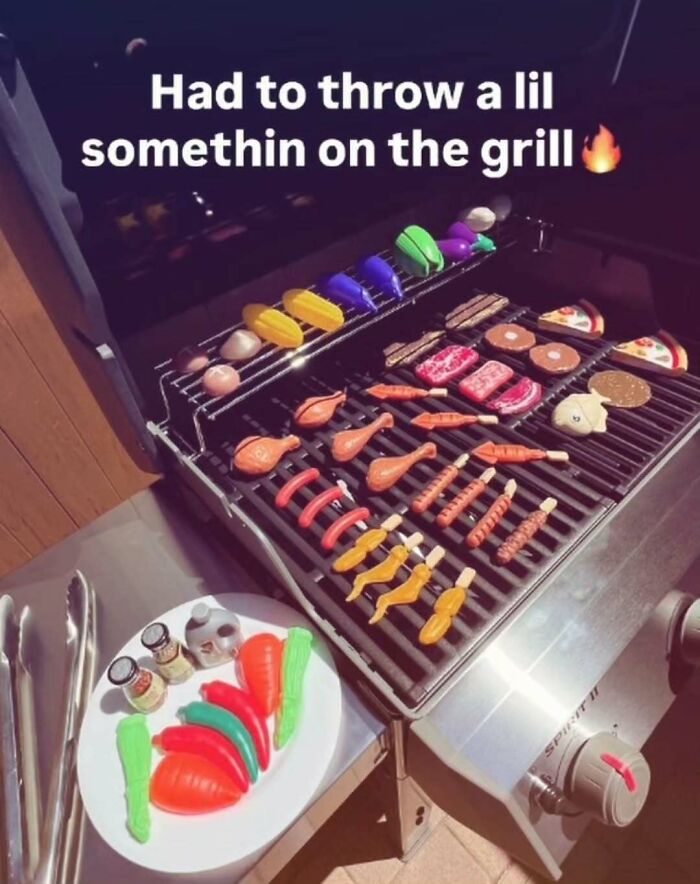 A grill filled with colorful plastic play food, a painfully cringe post about a pretend barbecue.