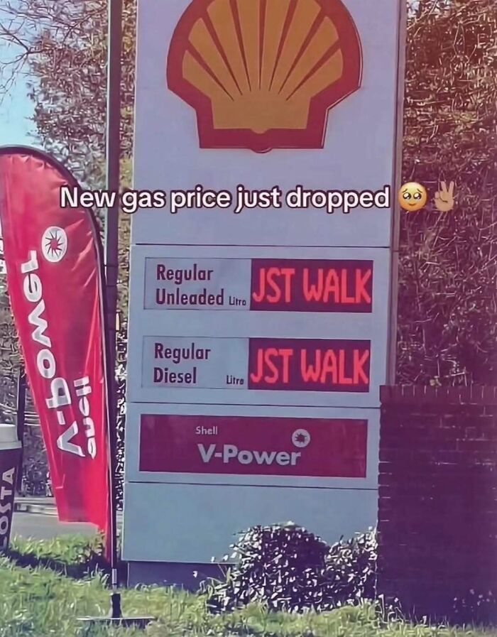 A gas station sign displaying 'JST WALK' instead of prices, a painfully cringe post about fuel costs.